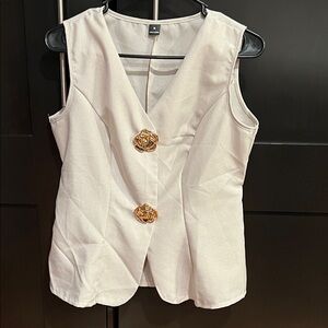 Elegant Cream Sleeveless Top with Gold Accents